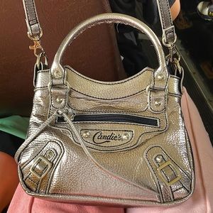 Candies purse kid new with no tags worth a lot silver